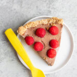 photo of chocolate pie with raspberries