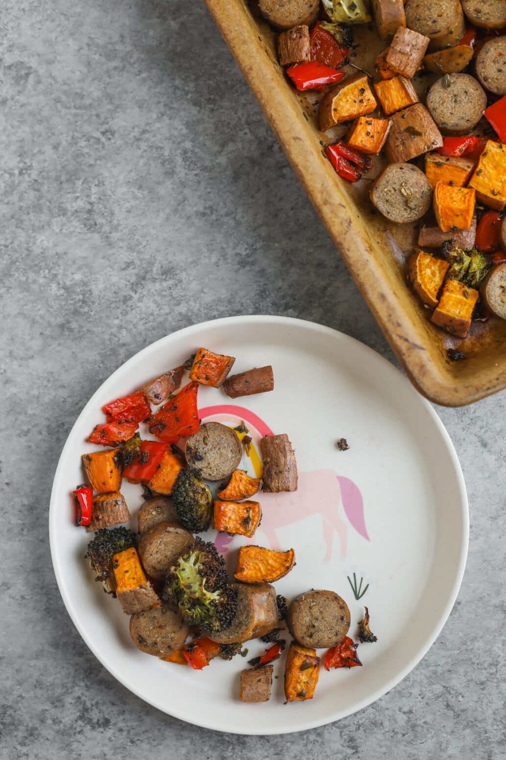pan of sheet pan and sausage with veggies